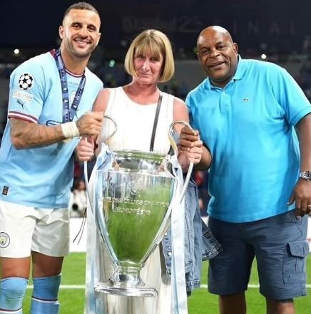 Tracey Walker with her husband Michael Walker and son Kyle Walker in November 2023